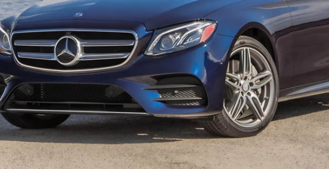 Front detail of the navy Mercedes-Benz E-Class used for every Atlantic Way Executive Travel journey